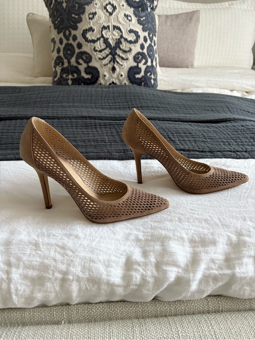 BCBG Perforated Pointed-Toe Stiletto Pumps in Beige Suede.